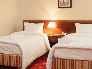 Гостиница "Grand Tien Shan Hotel" | Deluxe Twin (Полулюкс 2-местный с двумя кроватями)